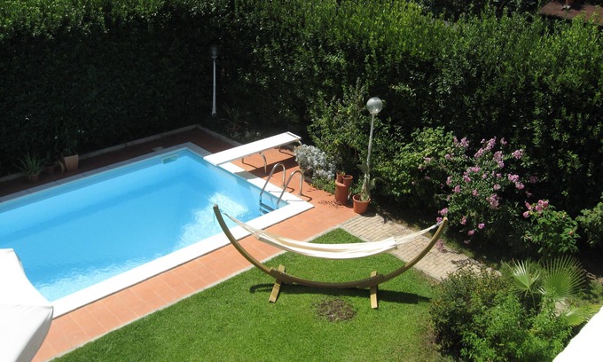 Bolognina Apartamento | Elegant city apt., private swimming pool, parking,bikes, wifi, terrace