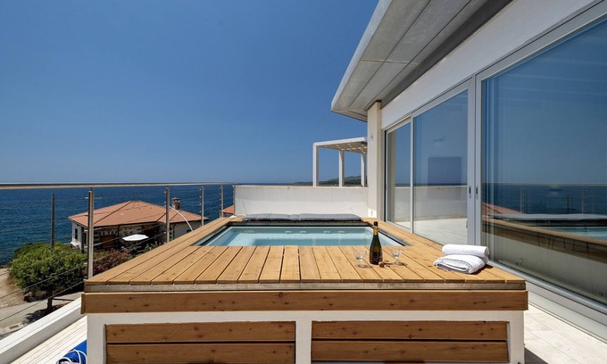 Fertilia Villa | STUNNING SEAFRONT VILLA IN FERTILIA 10 guests