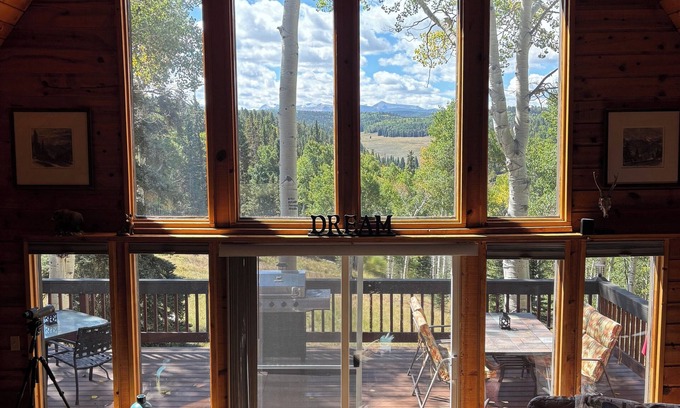 Cimarron Cabina | Escape to the heart of the Colorado mountains at this peaceful cabin retreat.