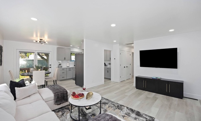 Burley Casa | Experience elevated comfort in this thoughtfully designed retreat. Featuring two inviting bedrooms, a fully equipped kitchen, and serene details, it blends simplicity with style for a clean, welcoming stay.
