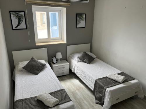 Msida Casa | F5 Room 3, Private Room two single beds shared bathroom in shared Flat