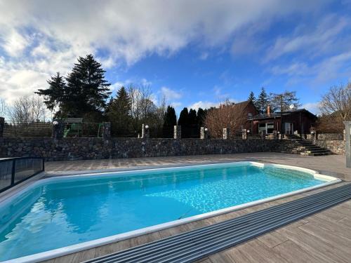 Dolgen am See Casa | Ferienhaus MILA - Pool, Sauna, Whirlwanne, 5000qm Privatgelände mit Bolzplatz