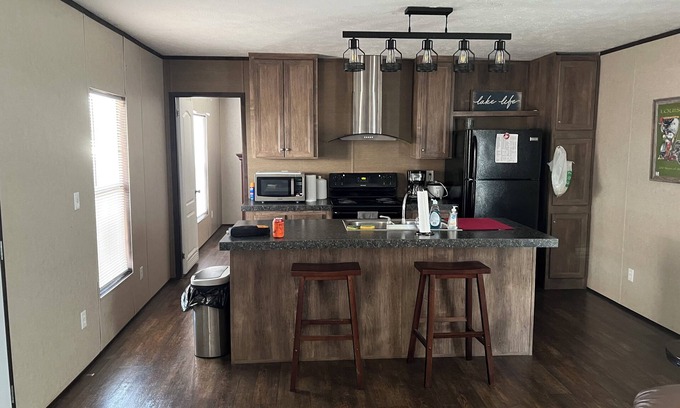 Hackberry Casa | Fishing camp with boat stall cleaning table three bedroom two bath