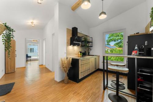 Miesbach Apartamento | Flussperle Miesbach - Entspannung pur, direkt an der Schlierach, Vollküche, kostenfreies Parken