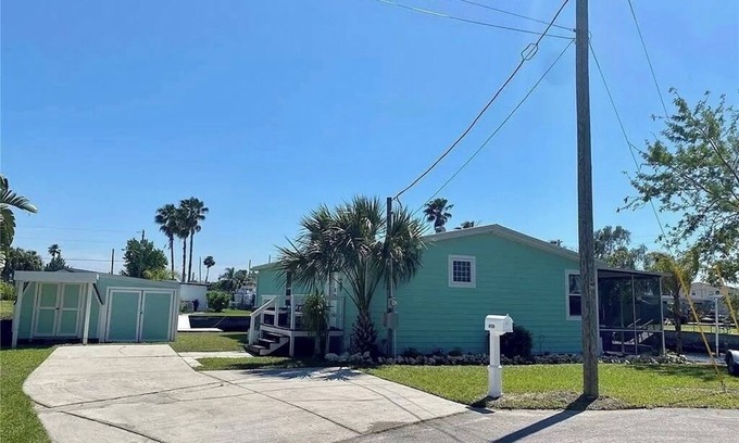 Vista Del Mar Casa | Fully remodeled, adorable coastal canal house on a spacious corner lot.