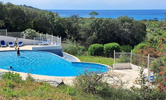 Lozari Condominio | Garden level, air-conditioned, beach 200m away and swimming pool.