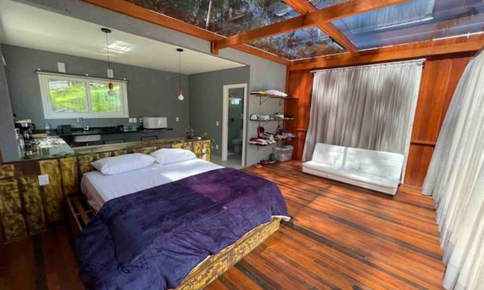 Pantano do Sul Casa | High Standard Glass House - Hosting with Purpose