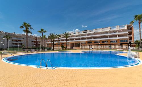 Playa de Almarda Apartamento | Global Properties, Planta baja con piscina en Almenara