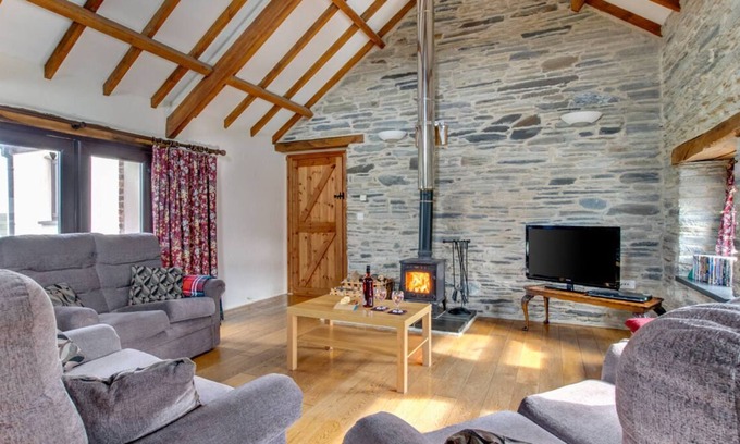 Whitland Casa | Este granero convertido ofrece vistas panorámicas a lo largo de la gloriosa campiña del oeste de Gales y hasta