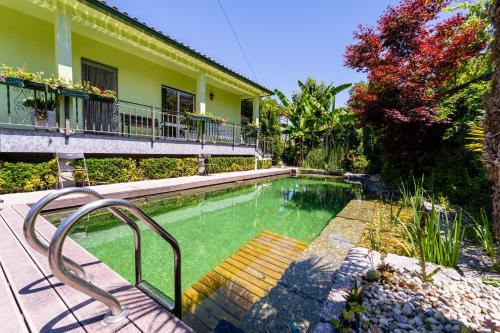 Guimaraes Casa | Gondomar Guimarães - Moradia V3 com piscina natural by House and People
