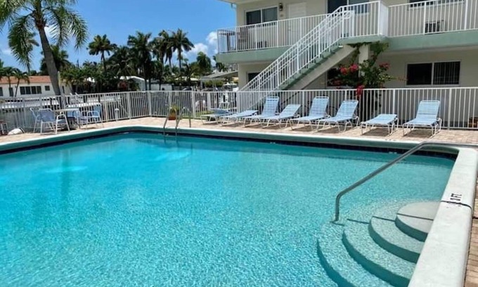 Harbor Village Condominio | Gorgeous Florida Waterfront Condo 1st Floor, with Large Heated Pool & Patio