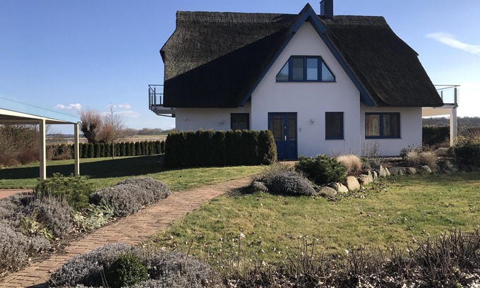 Grubnow Casa | Vista al lago garantizada - casa con techo de paja en Liddower Strom