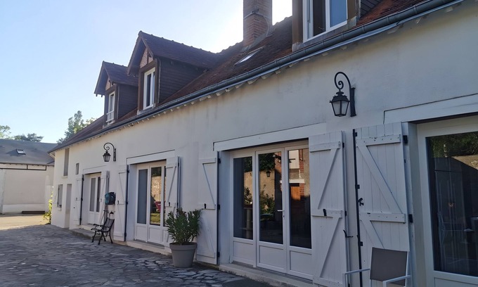 Cour-Cheverny Cama Y Desayuno | Casa de huéspedes 'Chambre Coquelicot - Le Petit Puits' con jardín compartido y Wi-Fi