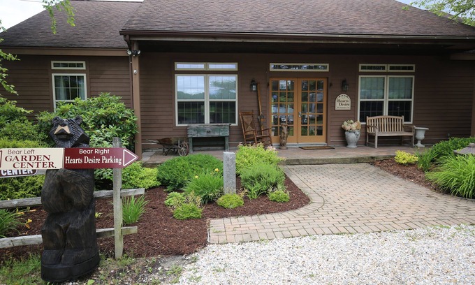 Lanesborough Casa | Hearts Desire is a furnished whole house in a small, colorful garden center.