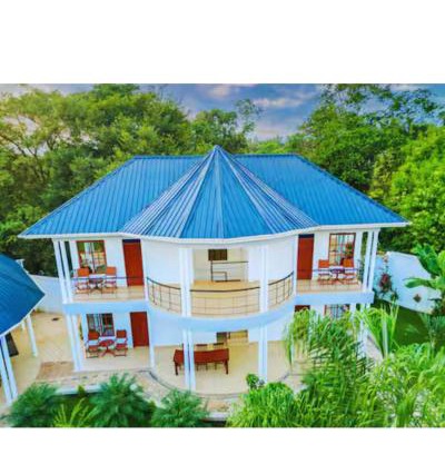 Moshi Cama Y Desayuno | Hellens Riverside Villa Luxury Garden Room