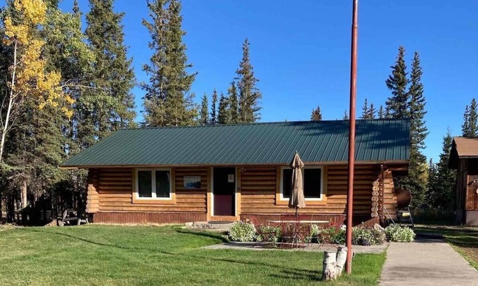 Tok Casa | Casa de troncos históricos cerca de servicios.