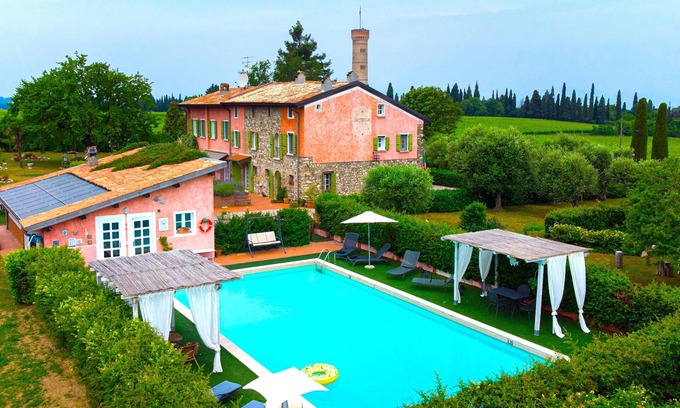 San Benedetto di Lugana Villa | Historical overlooking Lake Garda Villa with private park and swimming pool.