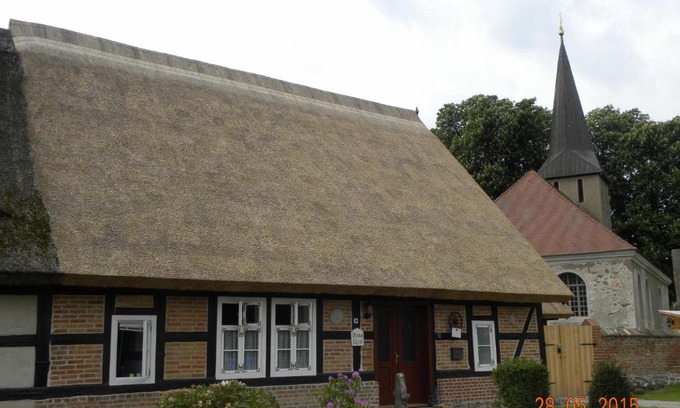 Putzar Casa | Historisches Küsterhaus Reetdachträume