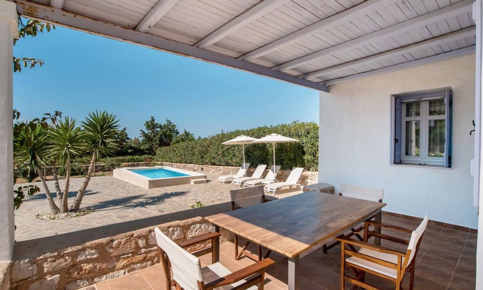 Chrissi Akti Casa | Casa de vacaciones 'Blue Xenia' con vistas al mar, Wi-Fi y aire acondicionado