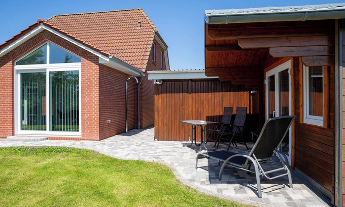 Pellworm Casa | Casa de vacaciones 'Kleine Liebe' con terraza privada, jardín privado y Wi-Fi