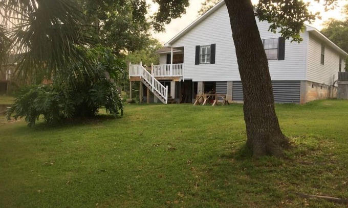 Theodore Casa | Home just off East Fowl River on deep water canal