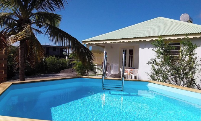 Damencourt Casa | Homerez - Casa acogedora en Le Moule con piscina compartida