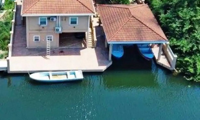 Río Sittee Casa | Hopkins Beach Retreat - Canal House, swim in ocean, kayak the river, ride bikes