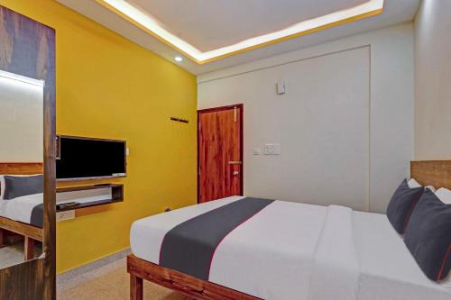 Krishnarajapura Hotel | Hotel O Sri Sapthagiri Comforts