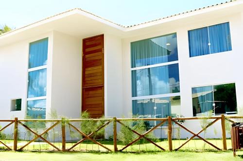 Parafuso Casa | Casa 6 Suites a 80 metros de la playa en Guarajuba