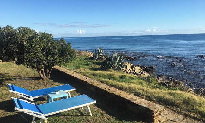 Stintino Casa | HOUSE ON THE SEA, WATERFRONT, BREATHTAKING VIEW WITH GARDEN AND PRIVATE BEACH