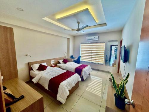 Kalamassery Hotel | Ikigai Business Rooms by Zoliva Homes