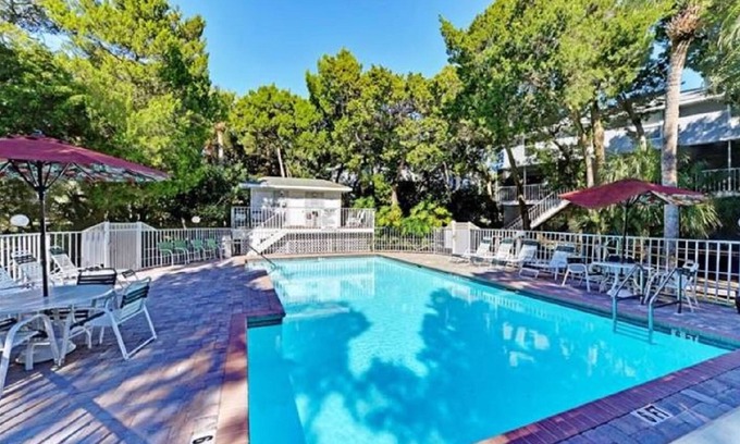 Holmes Beach Villa | In The Midst of Palms by AMI Locals