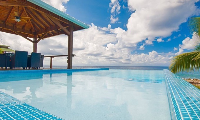 Antoneys Cay Villa | No se necesita alquilar un auto - Piscina infinita - Espectaculares puestas de sol - Vida de lujo