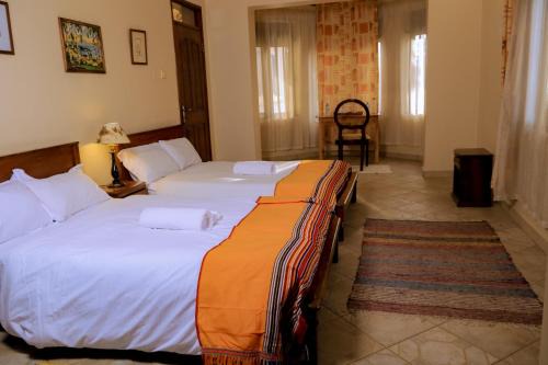 Entebbe Cabina | Inn The Wood