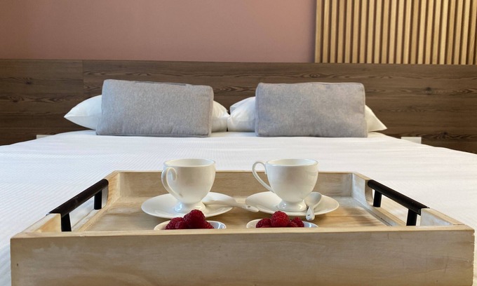 Pergine Valsugana Casa | Innesti Rooms & Apartments Green double bedroom with private bathroom