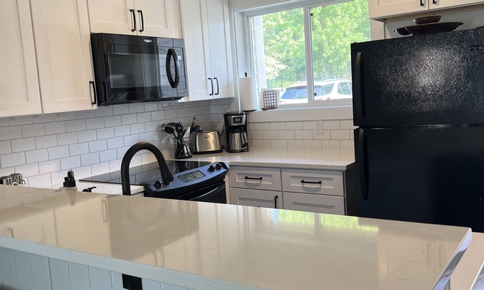 Onamia Villa | Izaty's Beach Villa - Lakefront 2BR Condo