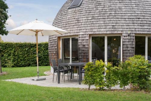 Muritz Casa | Kugelhaus Kirana - Ruhiges Naturdomizil in runder Bauweise am Waldrand des Tollensesees