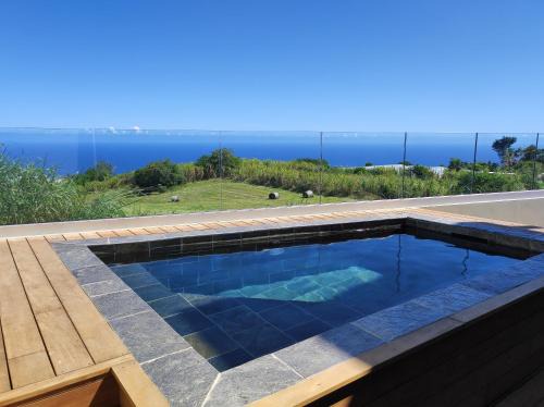 Les Avirons Apartamento | L'ApparT, meublé de tourisme 4 étoiles, piscine chauffée et vue mer imprenable