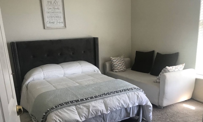 Hesperia Casa | Lake and mountain view bedroom in a custom home Hesperia