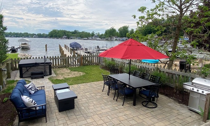 Paw Paw Lake Casa | Lake Life Awaits with Boat Pier, Beach, Hot Tub, Parking on Paw Paw Lake