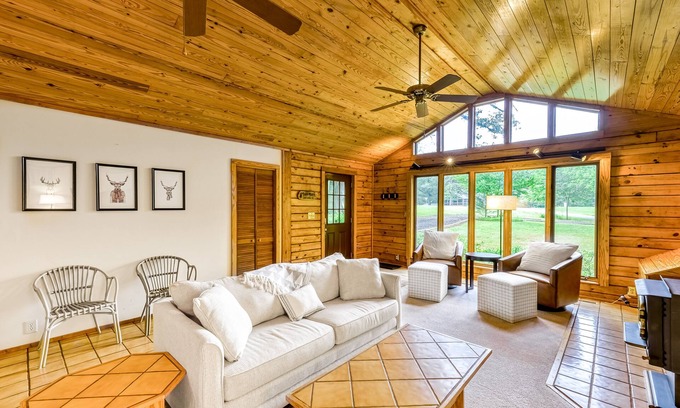 Blue Water Casa | Lakeside log home with a private deck, WiFi, firepit, central AC, & washer/dryer
