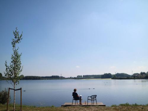 Municipality of Nissewaard Casa | Lakeview villa with swimming and fishing pier