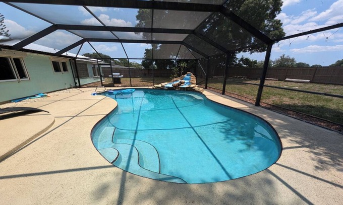 Interchange Square Casa | Large 4bd 2bth pool home with waterfall feature and private back yard!