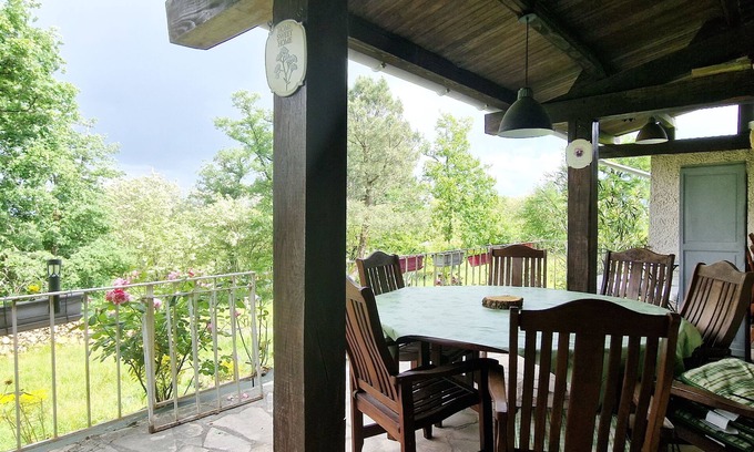 Brignac-la-Plaine Casa | Large house with covered terrace in the countryside, panoramic view