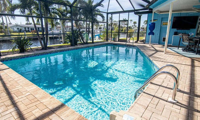 Lochmoor Waterway Estates Casa | "Latitude Adjustment" with Heated Pool and Boat Dock