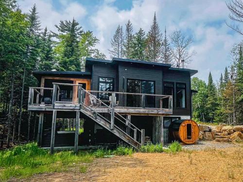 Saint Zenon Apartamento | Le Grand Duc- SPA- Kayaks- bord Rivière Noire- VTT- Motoneige- Randonnée