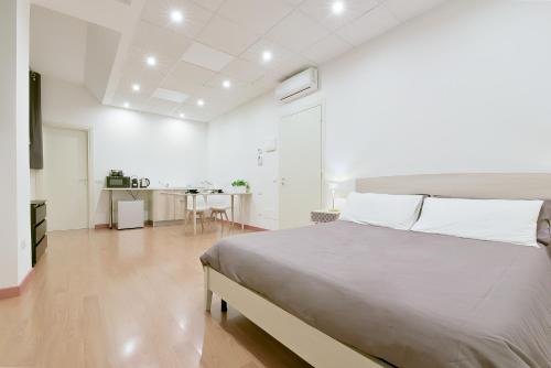 Centro Urbano Apartamento | LHE Les Trois Merveilles - Grey Lewis