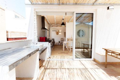 L'Ametlla de Mar Apartamento | Loft Alguer II con terraza, barbacoa y chimenea