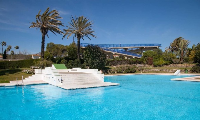 Bahia Dorada Casa | Encantadora casa adosada junto al mar con piscina, Cerca de la playa, jardines, piscina y pueblo