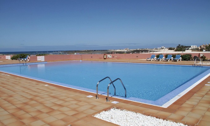 Los Lagos Apartamento | Mobiliario de lujo apartamento y vistas al mar en la playa de arena de Los Lagos + WLAN
